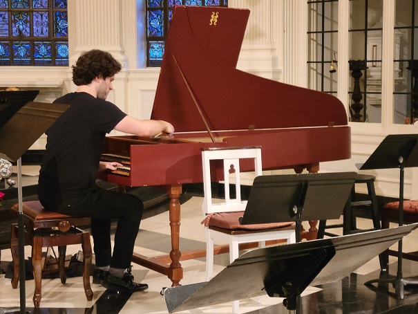 David Belkovski tuning the harpsichord